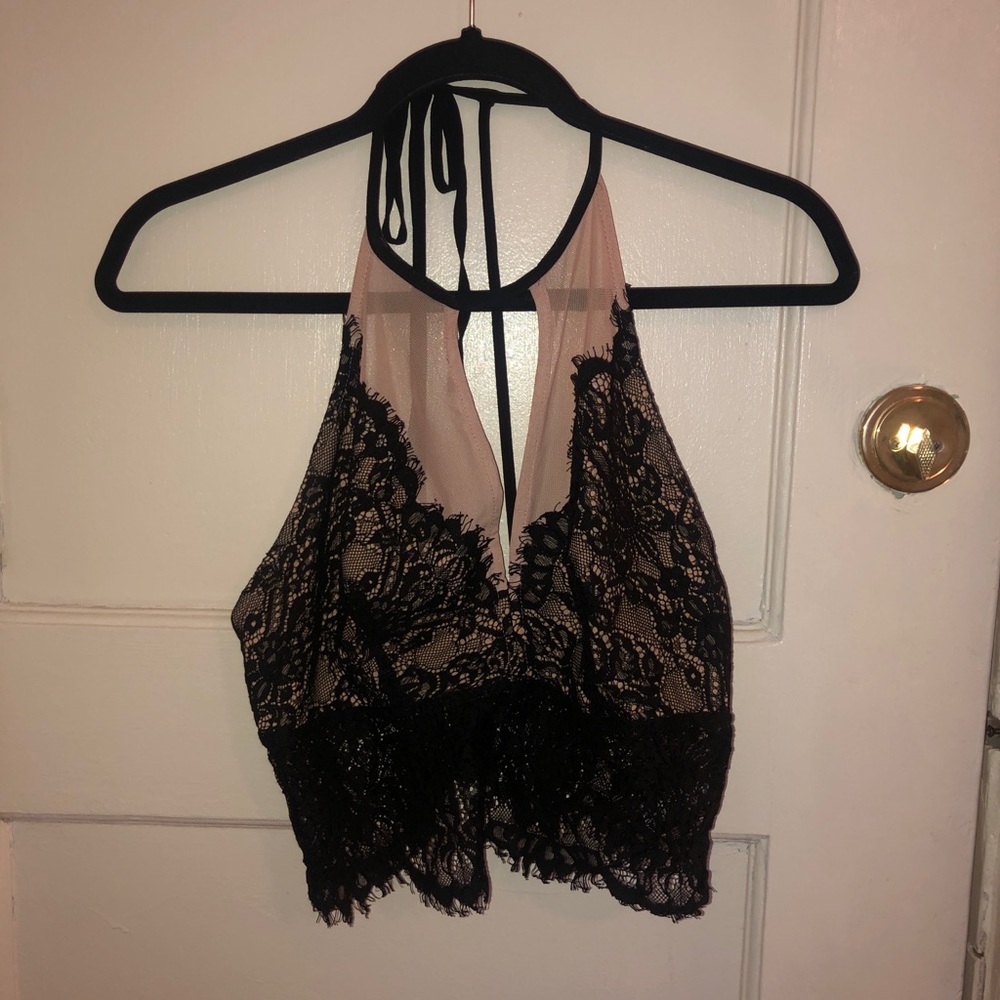 High neck lace going out top